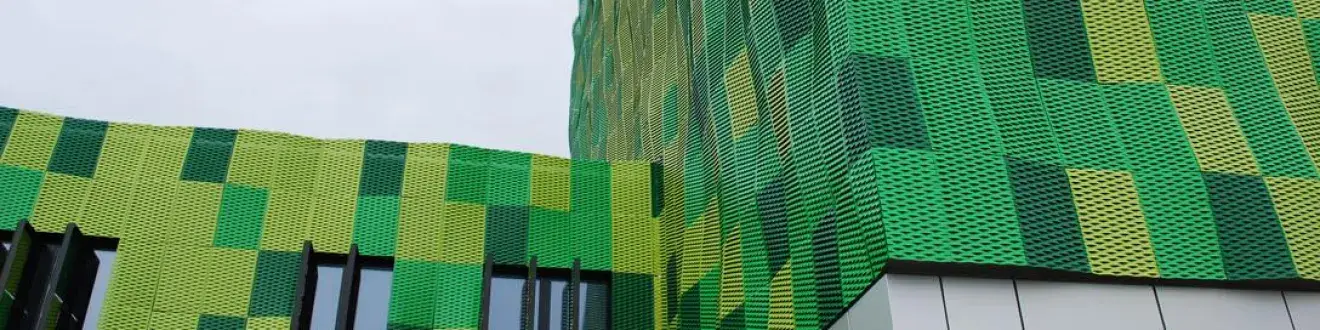 Expanded mesh camouflages the façade